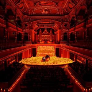 Musicians surrounded by candles 
